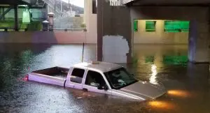 How Much Water In A Gas Tank Will Ruin A Car? truck submerged in water in engine